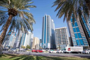 Belresheed Tower 2 surrounded by palm trees along Buhaira Corniche in Al Majaz Sharjah