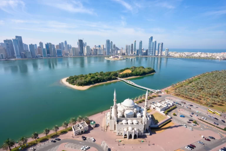 Al Noor Mosque by Khalid Lagoon with skyline view in Al Majaz Sharjah UAE