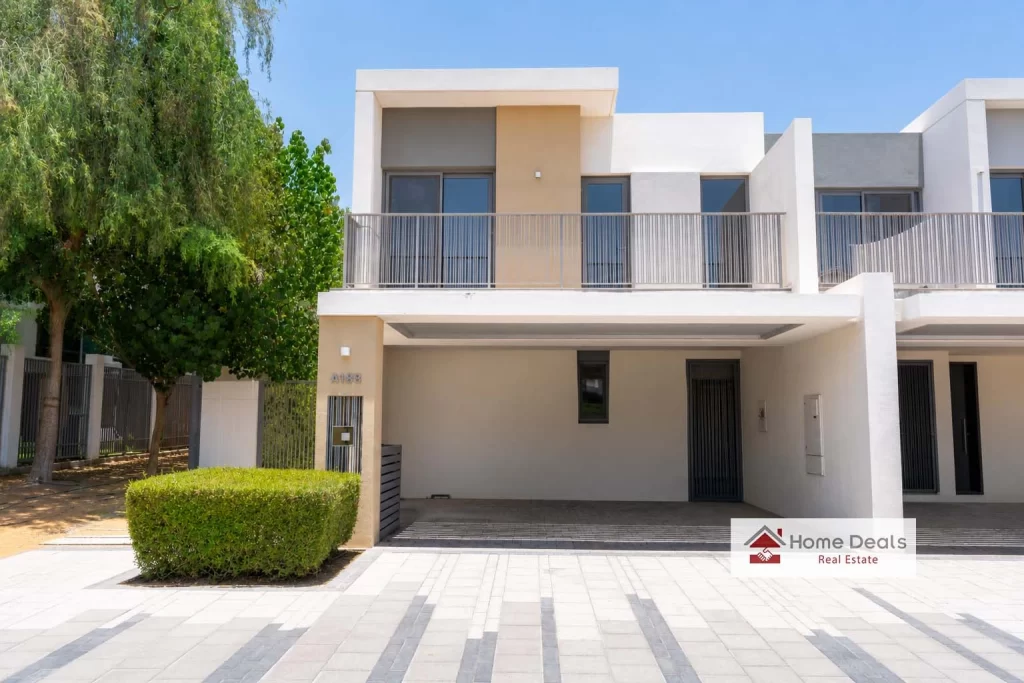 Elan 4BR Townhouse front elevation featuring private entrance and family-friendly surroundings