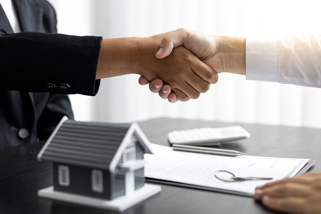 Real estate companies in Sharjah helping clients complete a property transaction