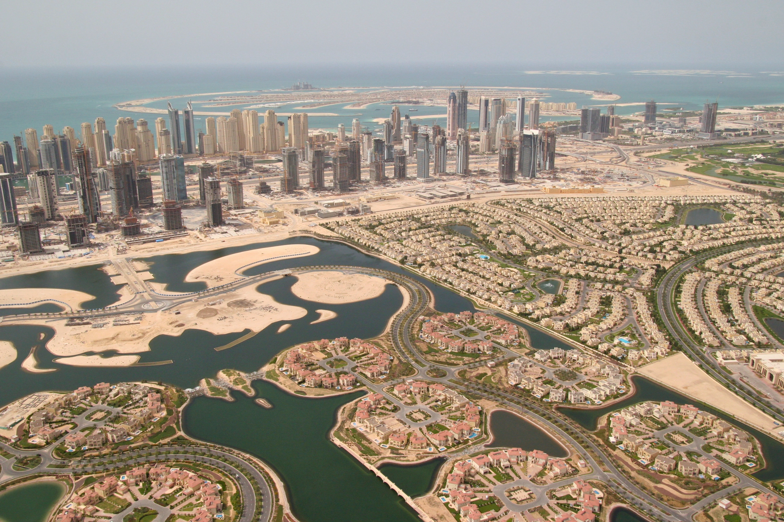 Real estate property keys representing buying, selling, renting and managing property in Dubai and Sharjah